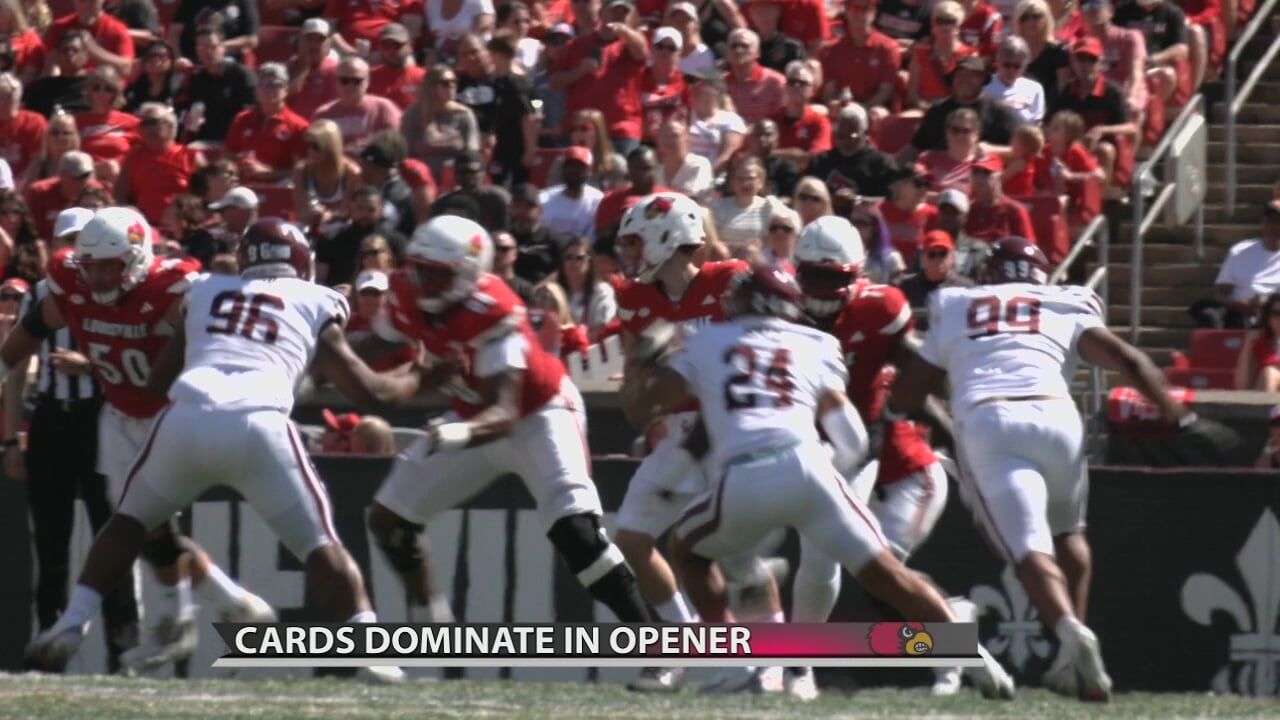 Louisville football players, coach happy with season opener win